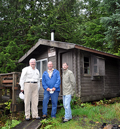 Island Wings clients at a forest service cabin.  A seaplane is the only way to access many cabins in southeast Alaska.
